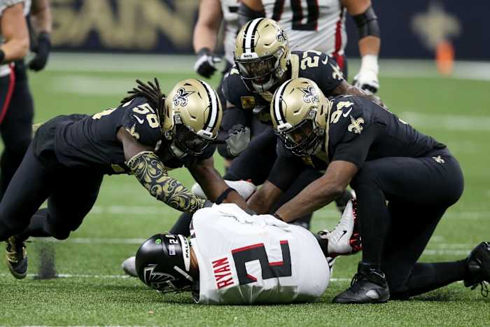 Atlanta quarterback Matt Ryan (2) is sacked by linebacker Demario Davis (56), safety Malcolm Jenkins (27) and end Cameron Jordan (94). Mandatory Credit: Chuck Cook-USA TODAY